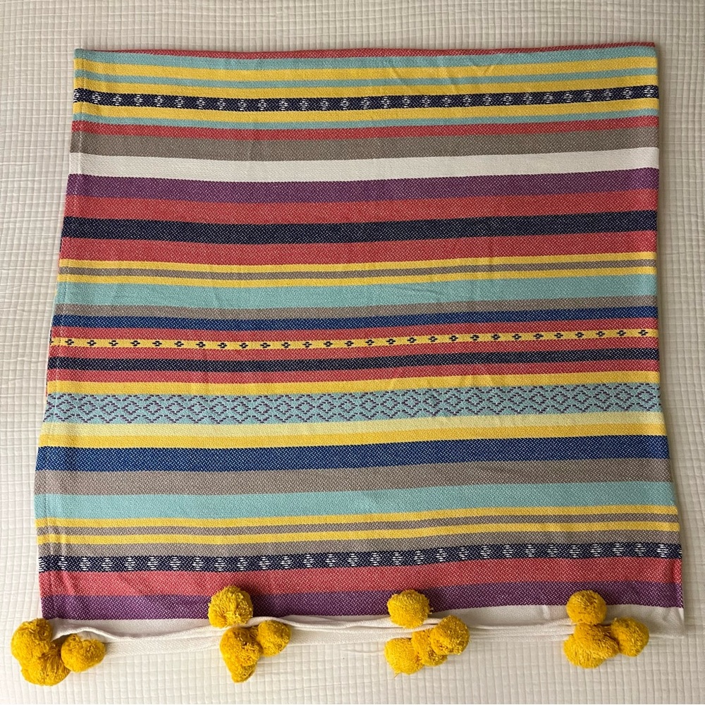 Extra Large Throw. 70”x70” hot pink Pom poms around the edges.